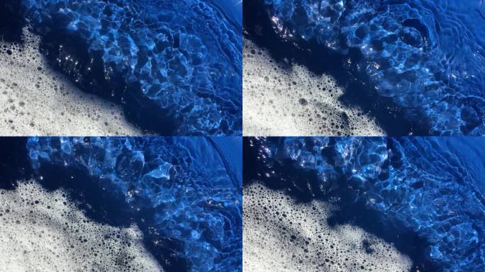 浴缸波光粼粼的流动水，漩涡喷水，蓝色浴缸