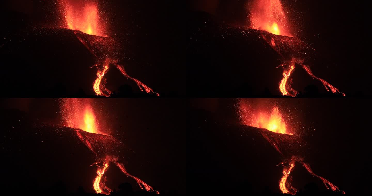 晚上拉帕尔马火山爆发，质量流崩塌。惊人的声音！ IGME无人机在图像的右上角飞行，小绿光。