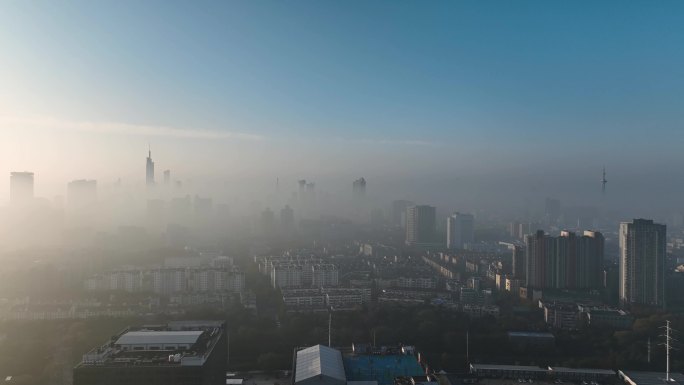 航拍日出平流雾下的南京城市风光