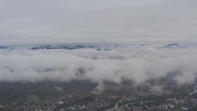 航拍雨后云端之上广西桂林城市山水风光视频