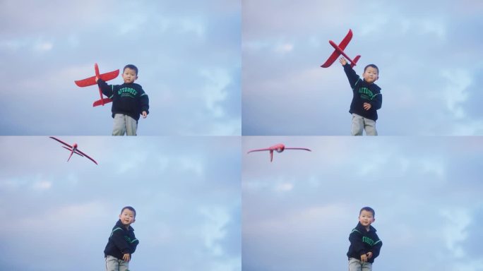 小孩草地扔飞机模型快乐时光父母陪伴儿童节
