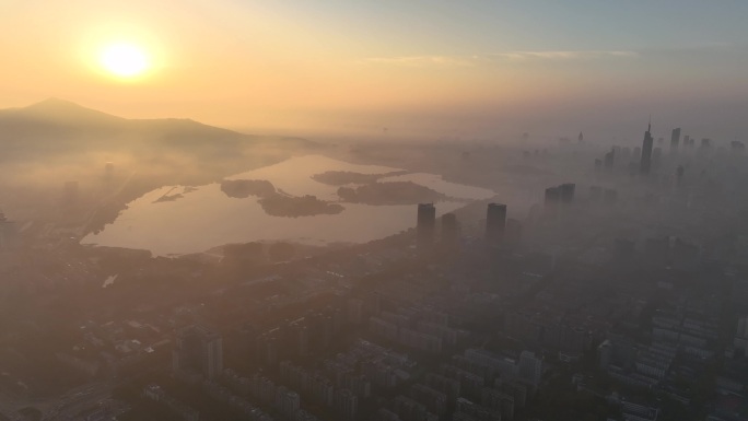 航拍日出平流雾下的南京城市风光