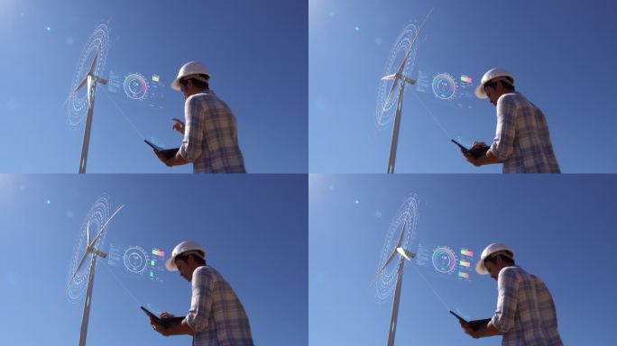 一名工程师在外面工作，控制风力涡轮机的能量。