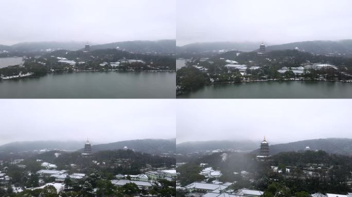 航拍雪中杭州雷峰塔