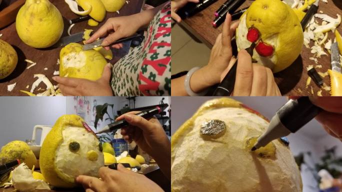 手工在沙田柚上雕刻作画