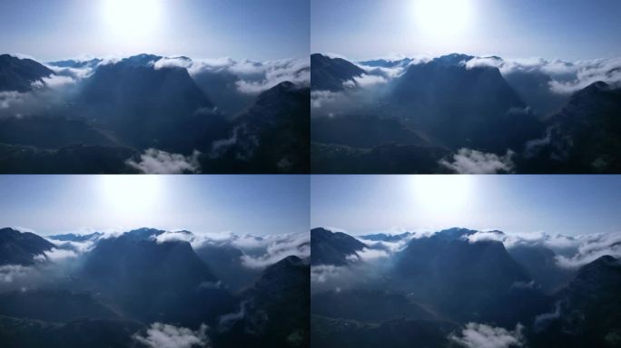雾气弥漫的山峦被太阳照射