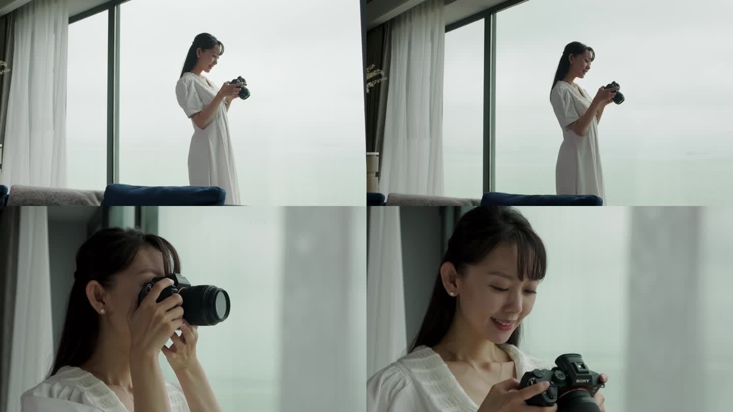 女孩窗边拍照拿相机地产广告