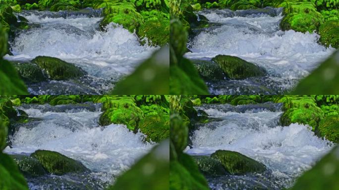 TIME WARP SLO MO泉水溅落在河床上的瀑布上