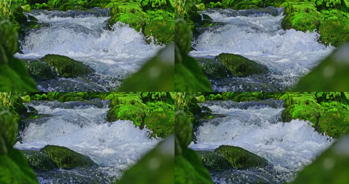TIME WARP SLO MO泉水溅落在河床上的瀑布上
