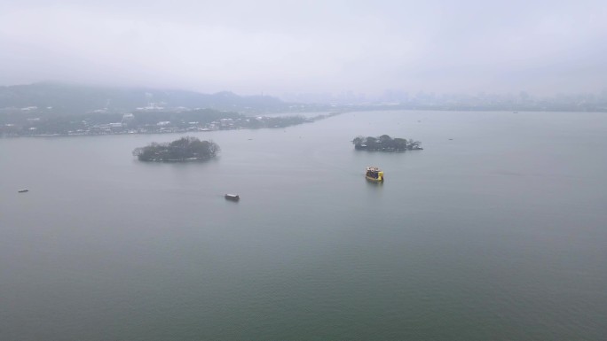 航拍雪中杭州西湖-龙船
