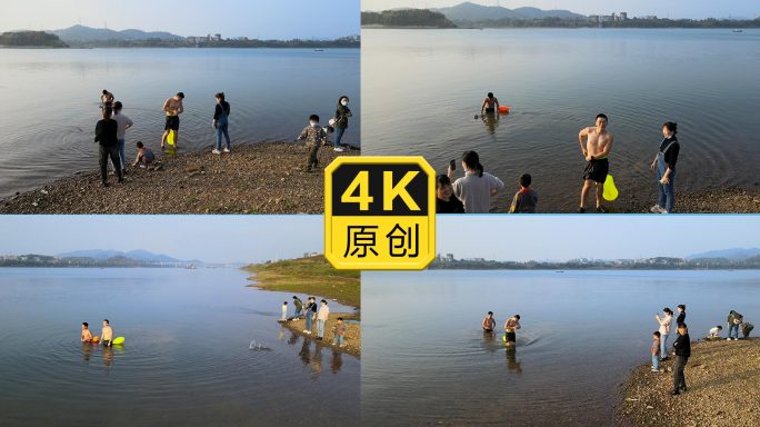 湘江河边玩耍的人冬泳