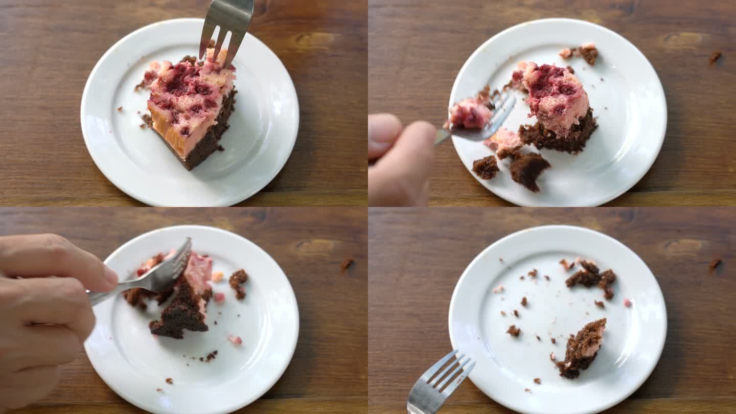 吃布朗尼树莓蛋糕。