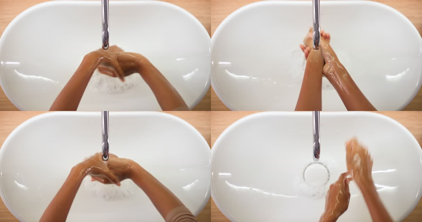 一个女人用肥皂洗手