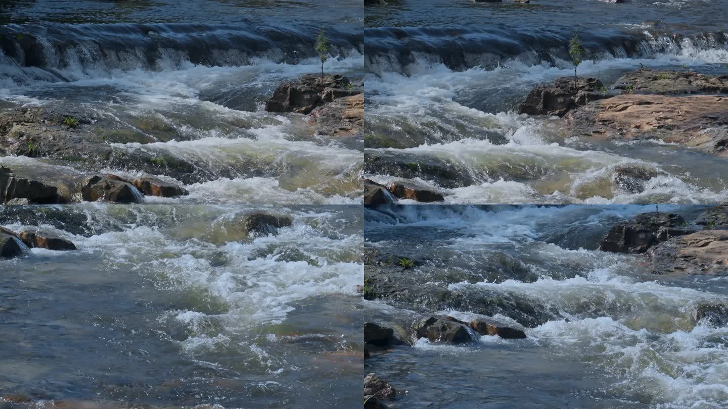 小溪小河山林间流淌溪水富含矿物质流水特写