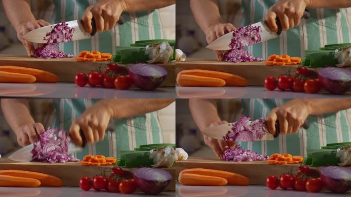 女人切红洋葱切菜做饭厨房