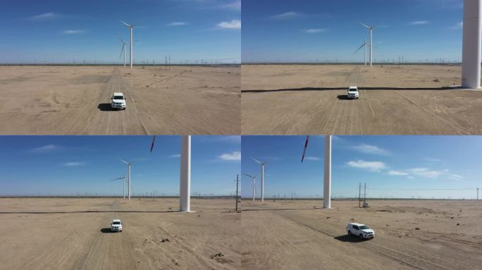 新能源风车下开车远航巡检4K高清视频素材