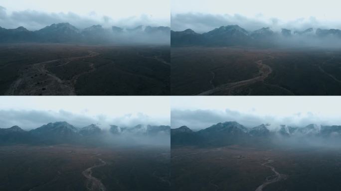 西部山脉云雾缭绕苍茫大地航拍