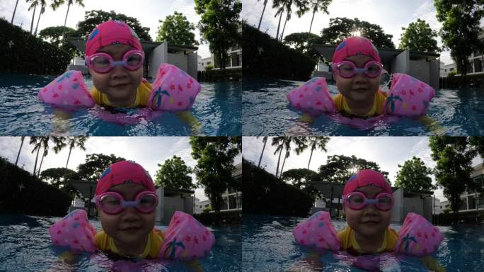 亚洲女孩游泳池亚洲女孩游泳池小孩学游泳夏