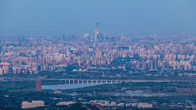 北京十五红月亮圆夜从CBD划过日转夜延时