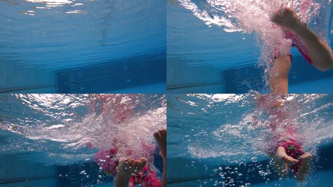 一个亚洲女孩游泳的水下视频。