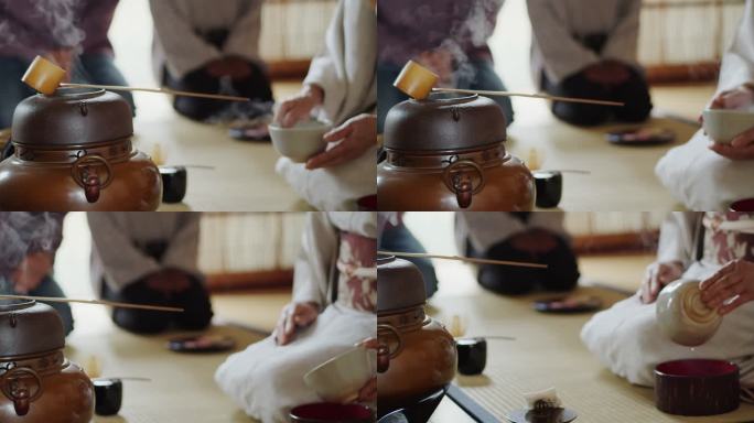 日本茶道主持人的手在器具之间移动