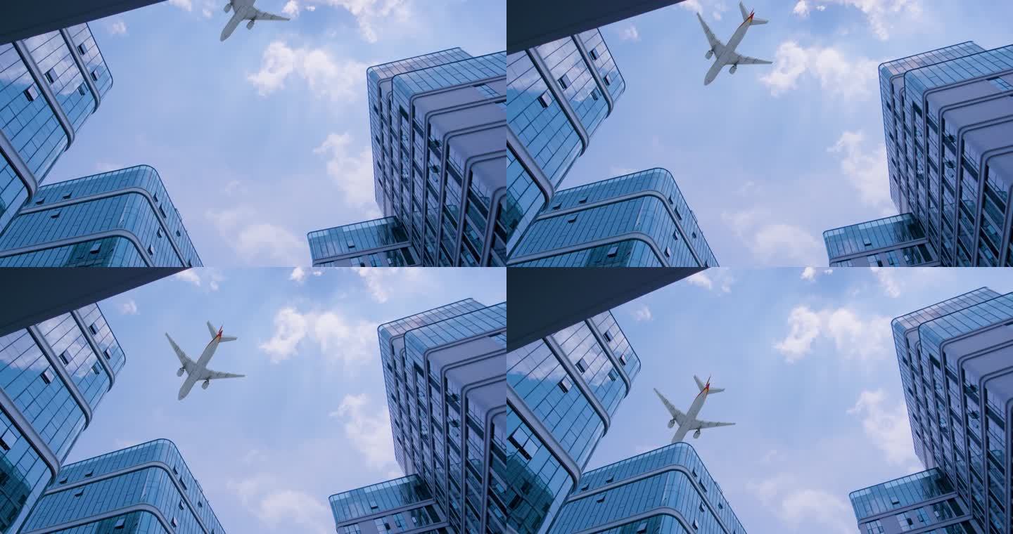 飞机飞过商务大楼高端商务写字楼