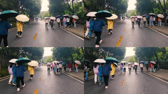 学生下雨天走路打伞