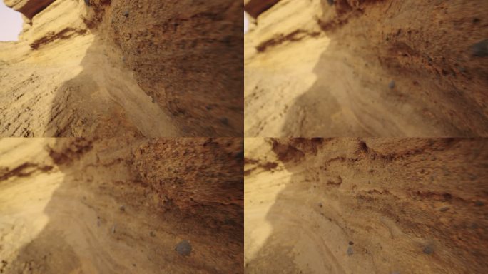 干旱气候中干燥的红色峡谷。特内里费岛阿马拉海滩的岩石走廊里摄像机旋转。岩石上的特写