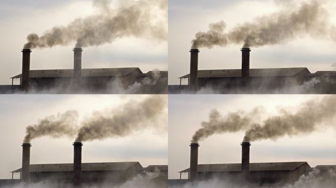 工业和污染概念，晚上在农村的烟囱工厂的4K视频，放大效果，工业和污染的概念