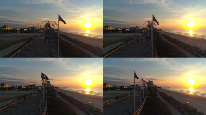 南卡罗来纳州默特尔海滩的日出。沿海岸向市中心和游乐园的鸟瞰图。