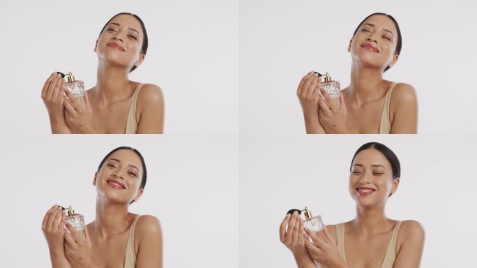 一位美丽的年轻女子喷洒香水的4k视频片段