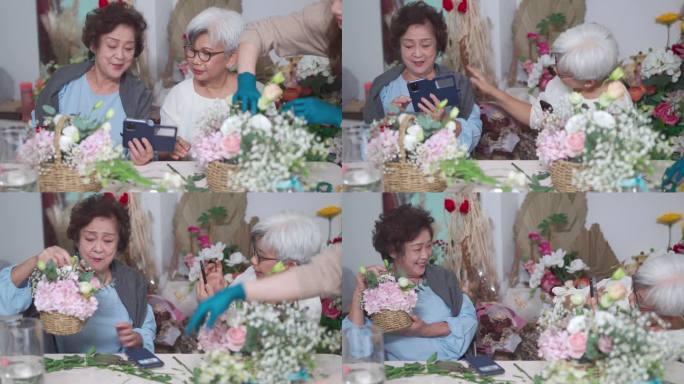 骄傲的亚洲华裔高级女性在插花课后用她们的手艺在花店工作坊拍摄她的朋友
