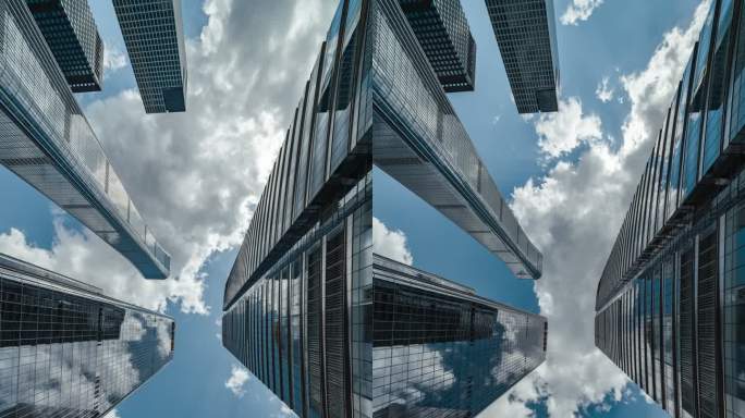 高层企业建筑、摩天大楼和天空的T/L低角度视图