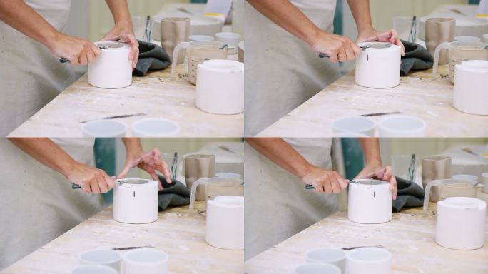 在陶艺工作室制作陶罐的女陶艺家
