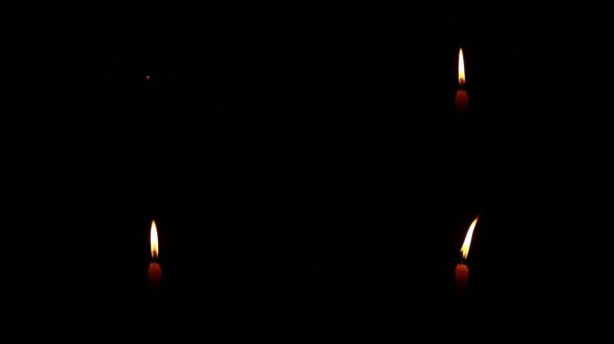 蜡烛点燃蜡烛黑暗中的烛光火光火烛黑暗光明