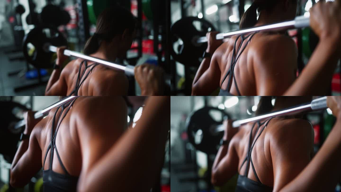 在健身房使用举重和训练设备进行肌肉训练