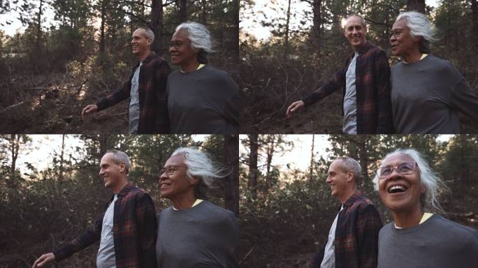 轻松的老年夫妇徒步穿越森林
