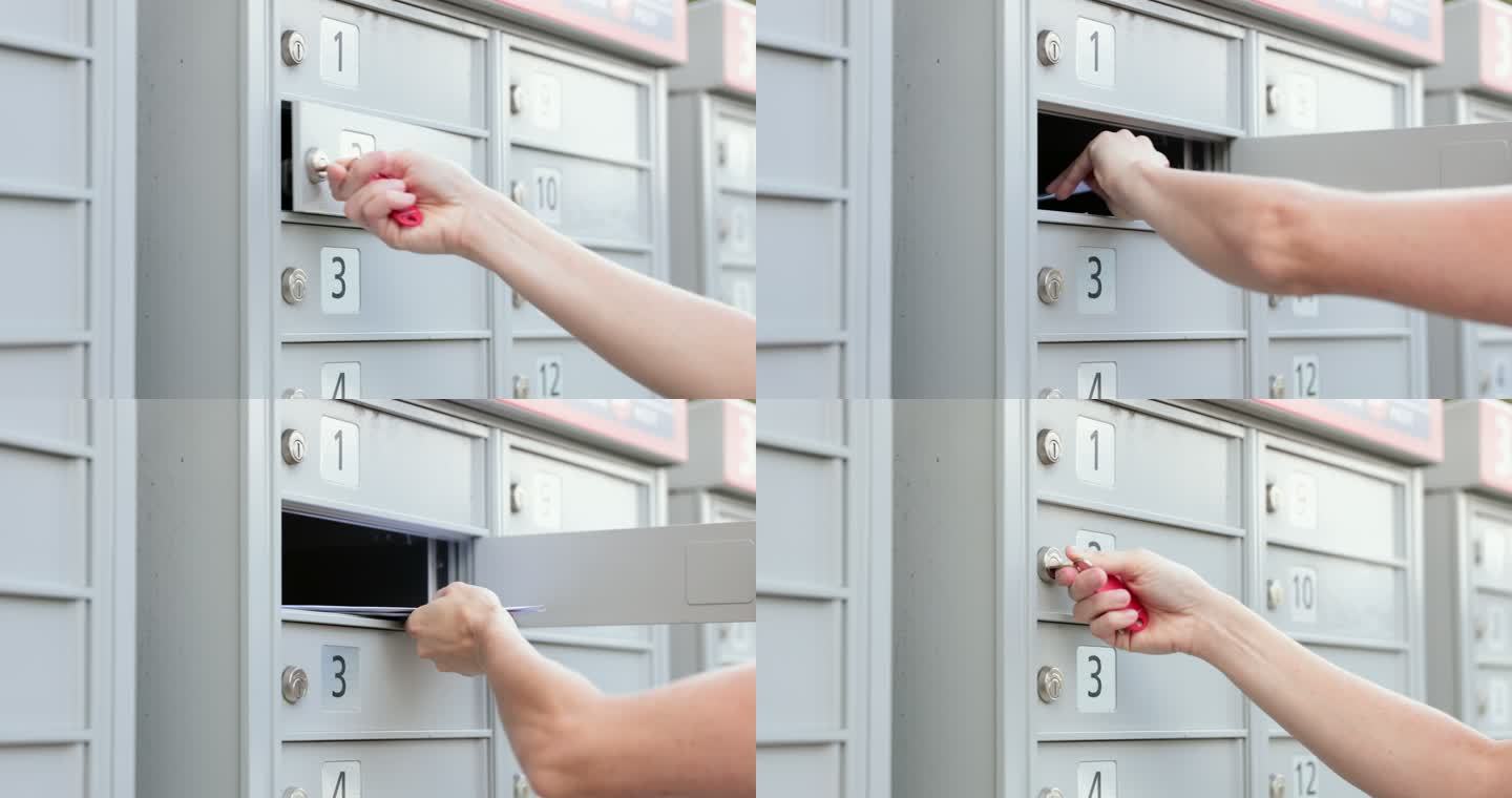 一名妇女在邮政信箱领取邮件