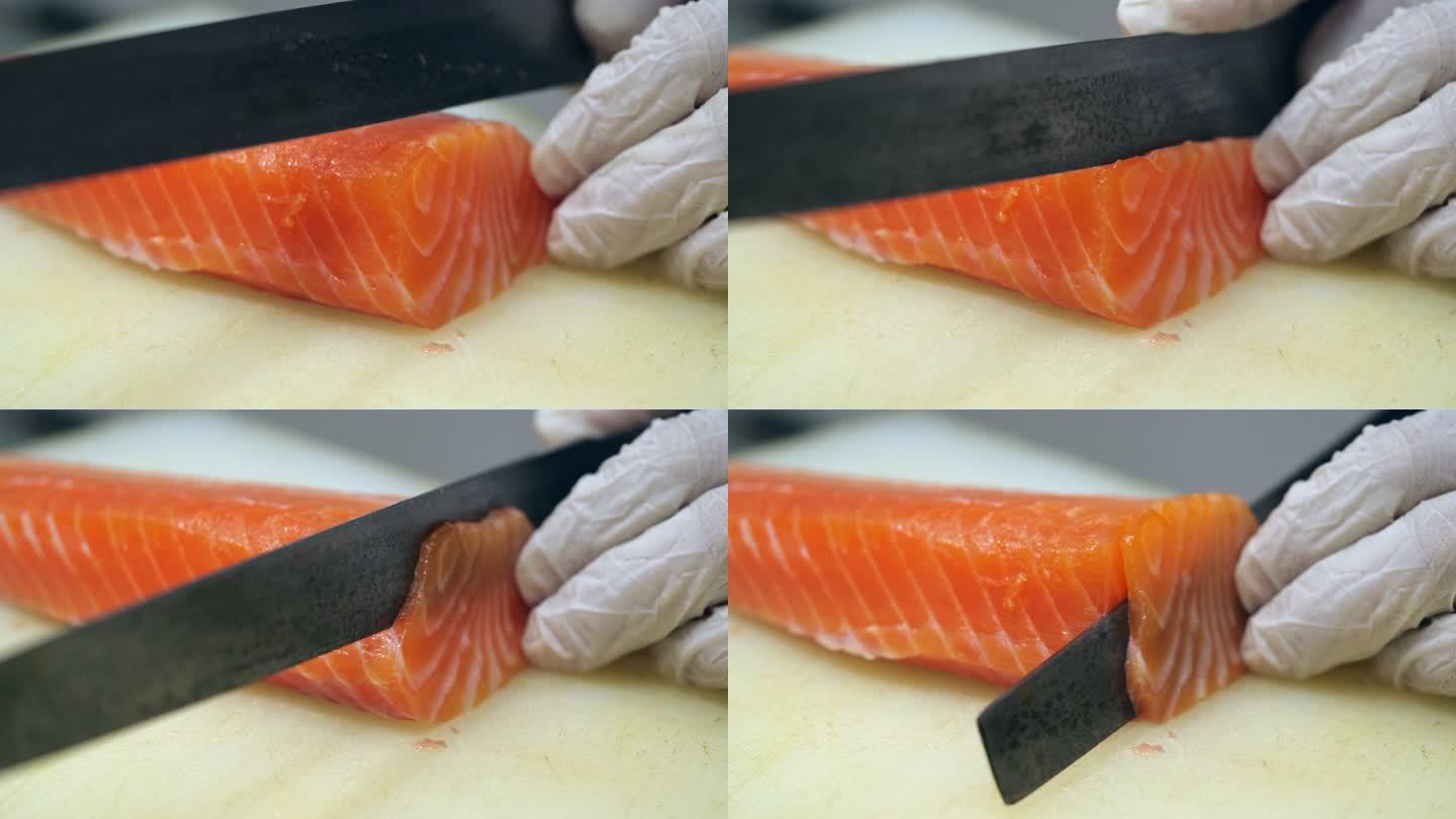 厨师用刀切生三文鱼