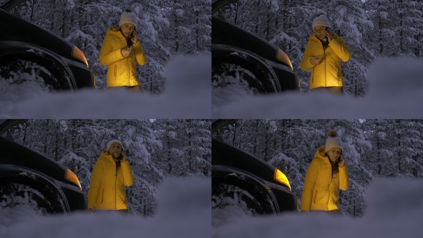 汽车在第一场雪中抛锚了。应急灯。天气不好时，汽车在偏僻的地方抛锚。汽车保险。一个女人在路上。