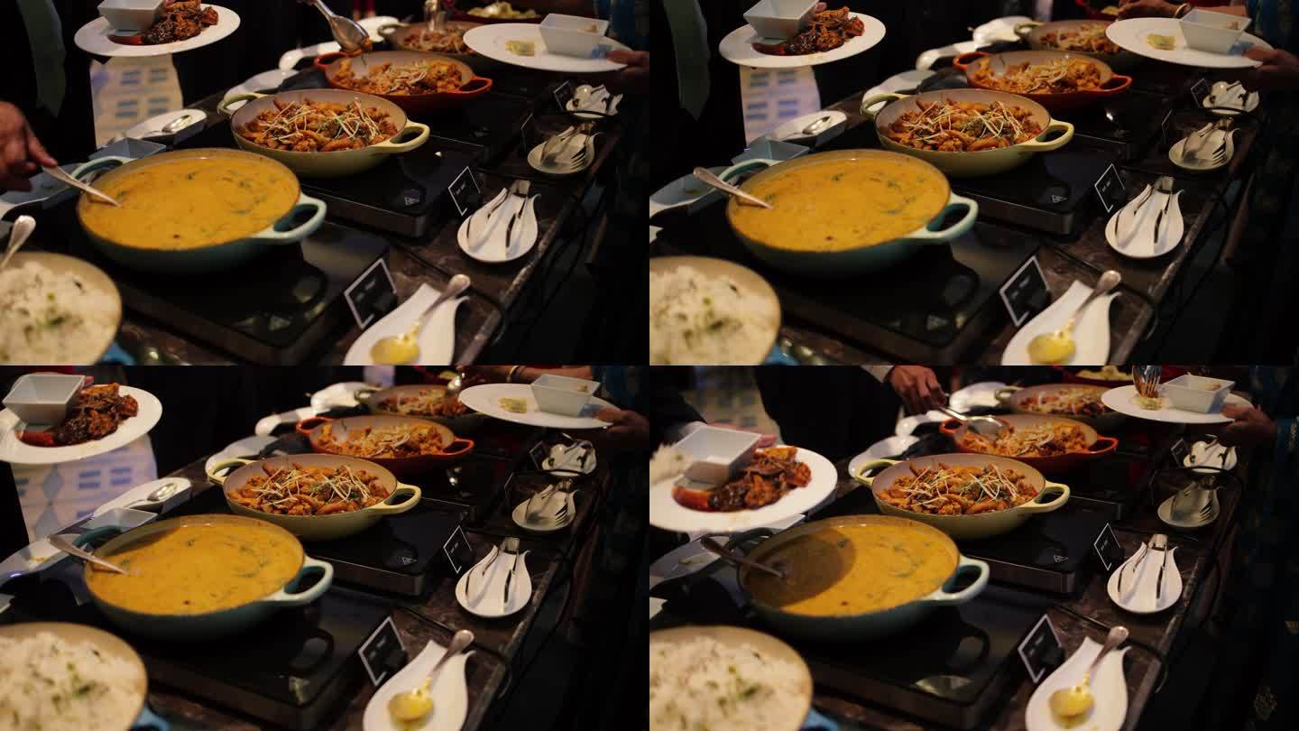 餐饮食品。人们在豪华餐厅享用室内自助餐。印度美食。印度自助餐。