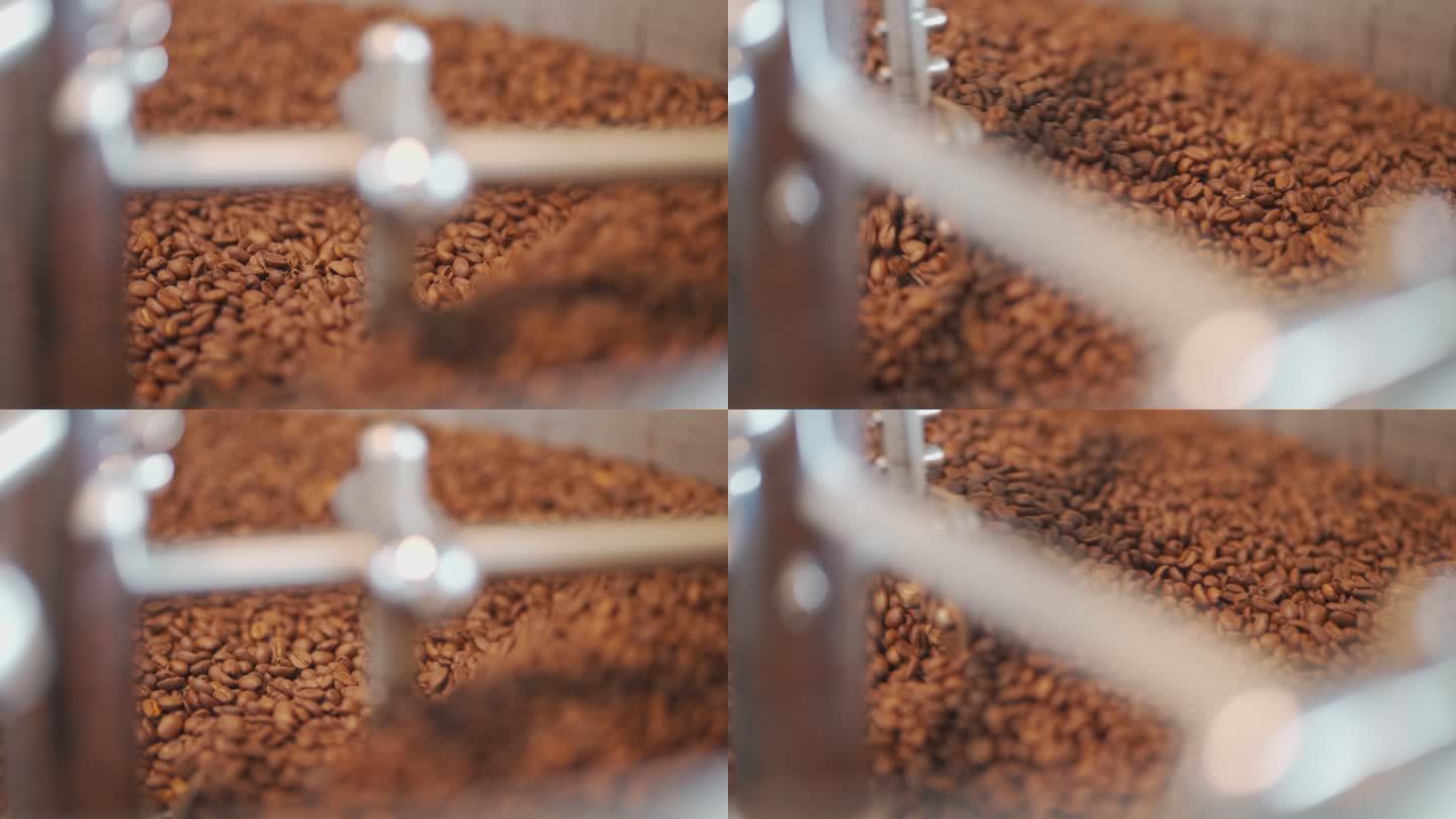咖啡烘焙机旋转冷却过程在大型工业烘焙机中烘焙一批高质量单一来源咖啡豆的过程；烤豆正在冷却循环中。