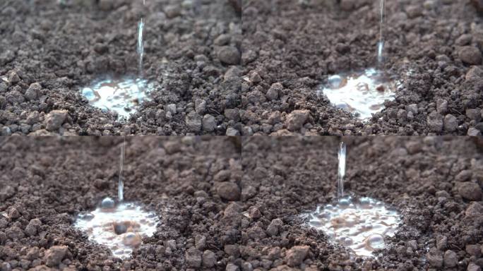 慢镜头土地滴灌浇水灌溉水流素材