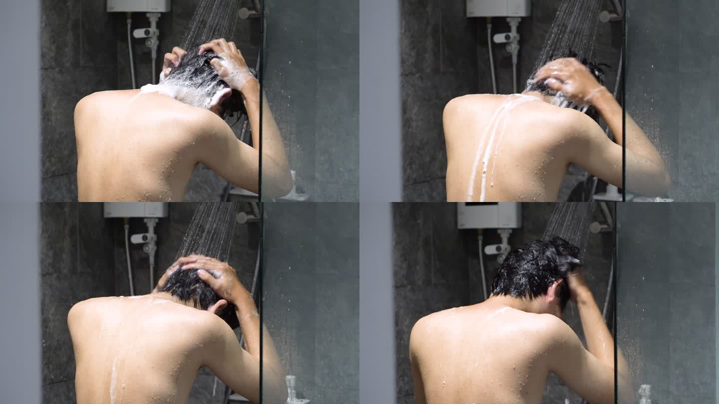 一个男人在洗洗发香波