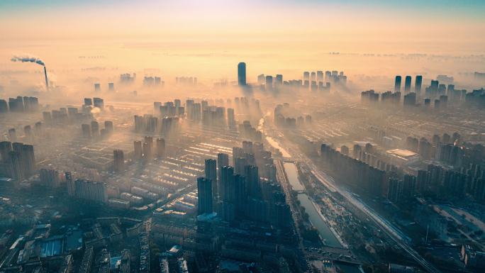 中国辽宁沈阳城市平流雾云层中的阳光航拍