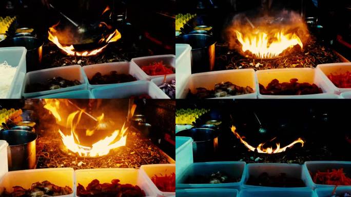 夜市小吃摊上的火焰与美食制作