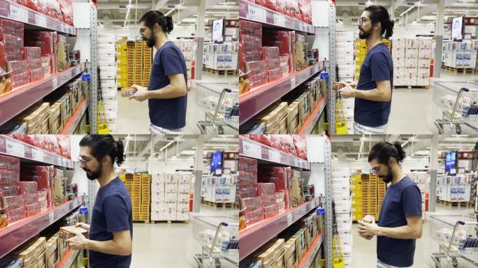 留胡子的男人在超市货架上挑选产品