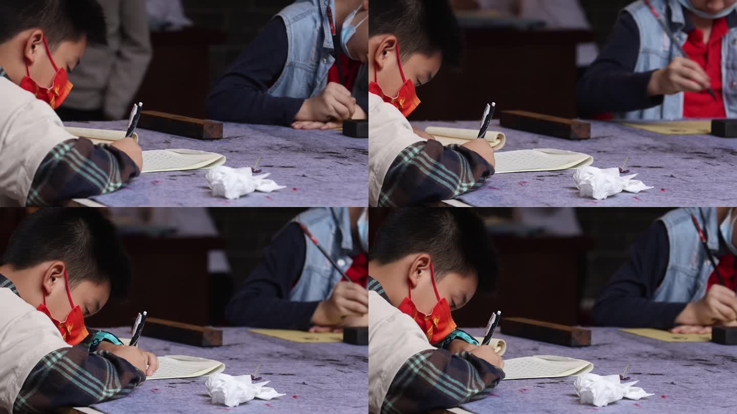 小学生练习毛笔字、写硬笔中国字