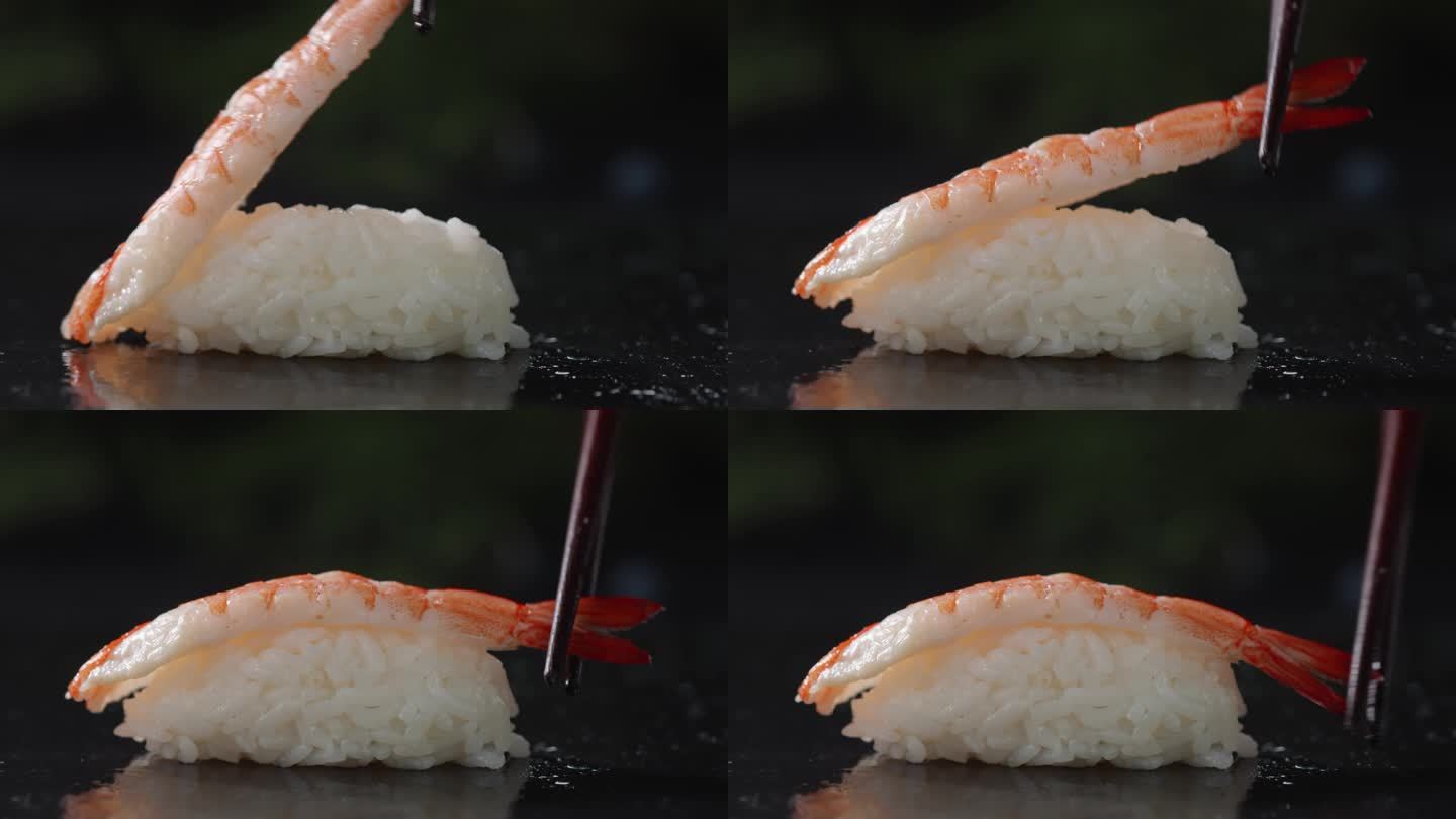 筷子夹起甜虾放在饭团上