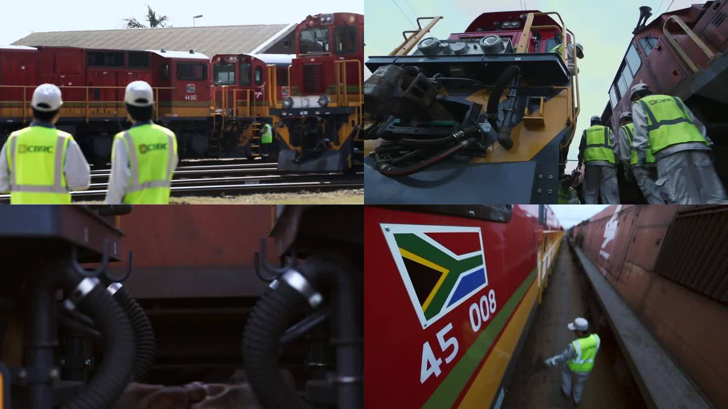 南非德班工作人员巡视检修内燃机车